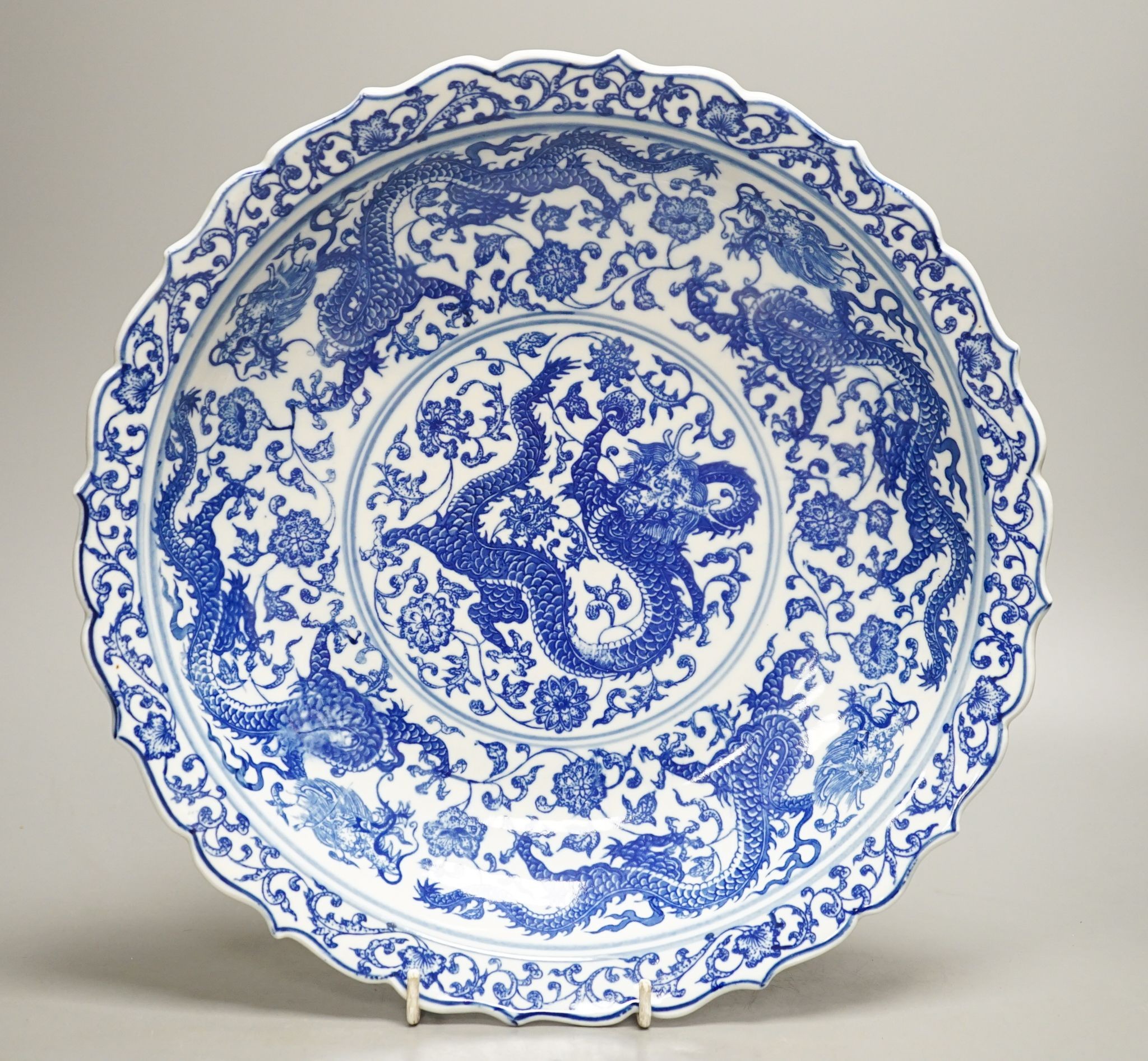 A Chinese blue and white ‘dragon’ dish 31cm